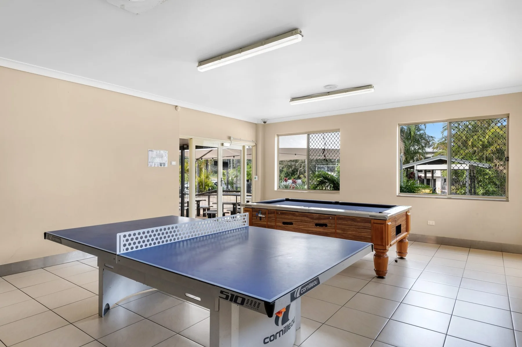 Table tennis table and a slate billiard table in the games room