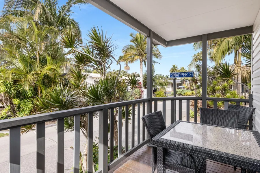 Private veranda of a Standard Cabin with outdoor table and chairs