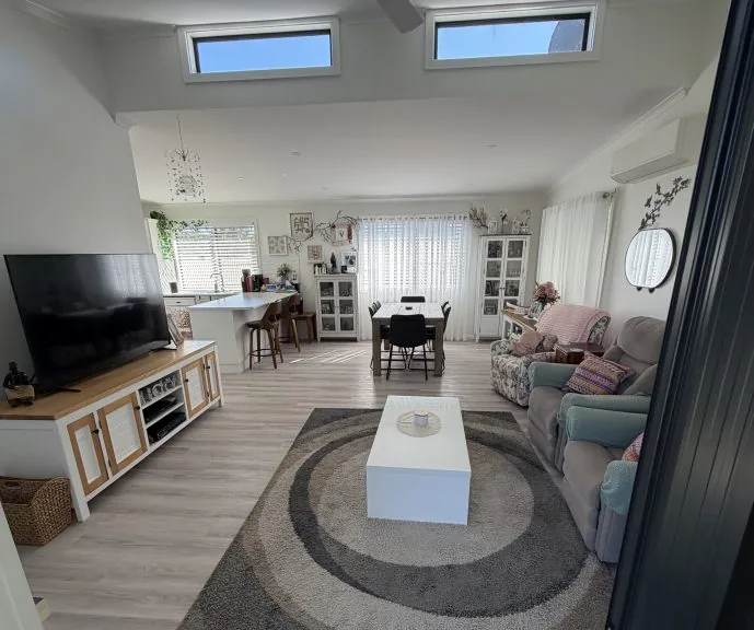 A bedroom in the Parkwood home with built-in robes
